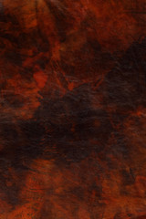 Brown leather texture background surface, natural grains and pores.Grunge, old and brown leather texture with dark edges.