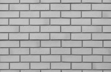 White brick wall. New smooth gray brick wall