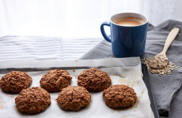 oat cookies and cup of coffee on the table