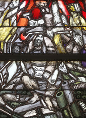 God bears the guilt of all mankind, takes hold of sinners and saves them from death, detail of stained glass window by Sieger Koder in St. John church in Piflas, Germany