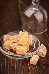 Candied ginger on a wooden table