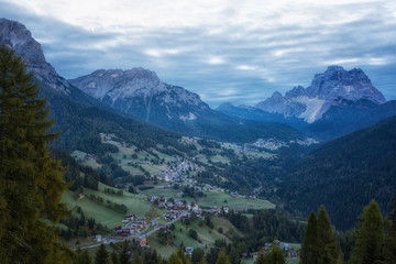 Fototapeta na wymiar A small village in the Dolomites in the morning twilight, Italy