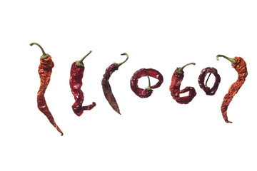 Dry chili peppers on a white background