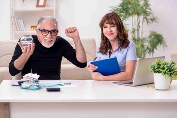 Financial advisor giving retirement advice to old man