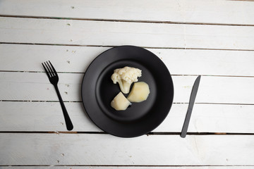 cooked cauliflower dish with potatoes