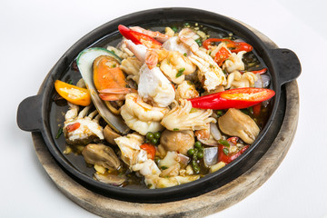 thai spicy seafood serve in hot plate