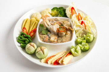 Crab dipping with vegetables serve in white plate closeup shot