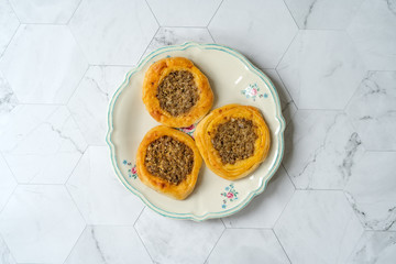 Kaytaz Pastry Pogaca with Minced Meat of Turkey Hatay Region in Plate.