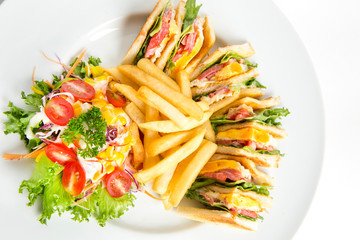toast bread sandwich grilled with fried egg tomatoes lettuce serve with french fried and salad