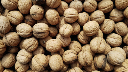 inshell walnuts as background