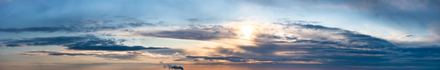 Fantastic dark thunderclouds at sunrise