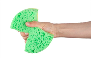 In hand a sponge for cleaning on a white background, workhouse concept.