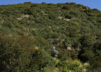 Fototapeta na wymiar small solar panel mounted and standing on a mountainside near Santa Barbara, CA