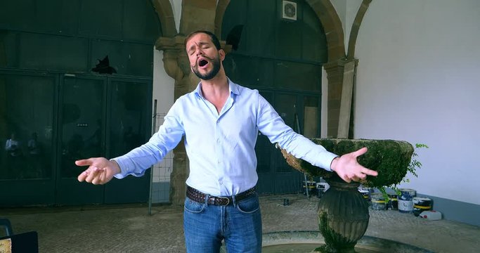 Non-ticketed free performance of opera tenor singer for tourists on the street of Lisbon, Portugal, 4K