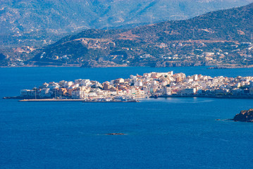 Fototapeta na wymiar Aerial view of the jutting village of Agios Nikolaos in the sea on Crete, Greece, Europe
