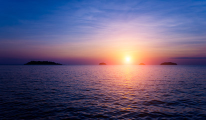 Beautiful sunset at the beach in the tropics. Sky and ocean