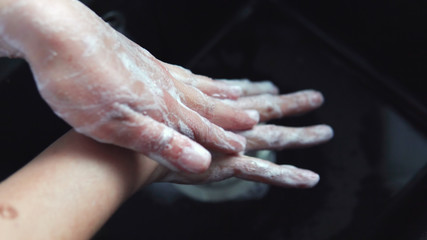 Fototapeta premium Wash your hands underwater for medical staff before working with patients who are sick coronovirus covid 19