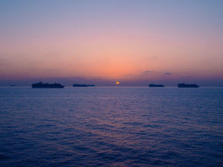 Obraz premium Cruise ships in the open ocean at the quarantine time during COVID-19 virus epidemic
