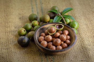 Macadamia nuts on sacks in natural light