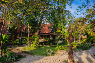 Swimming pool at exotic tropical resort. Exotic garden.