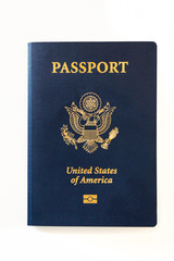 Latest version of United States of America citizen Passport with biometric ID chip. Person identification document isolated on white. Close up, copy space, background.