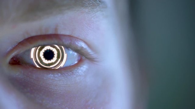 Bright white cyborg eye - close up