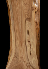 Texture of wooden slab on a dark background. Pattern of  brown wooden table. Top view