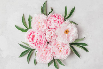 Flowers composition. Wreath made of pink peony flowers on white background. Flat lay. top view