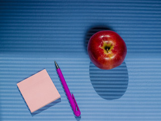 Red apple on yoga mat