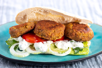 falafel in pita bread on a plate