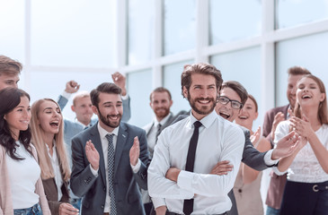 young entrepreneur and happy business team standing together.