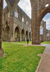 The ruins of Tintern Abbey, founded by Walter de Clare, Lord of Chepstow, on 9 May 1131. It is situated adjacent to the village of Tintern in Monmouthshire, Wales, UK.