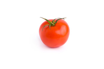 Fresh tomatoes isolated on white background. One whole tomato on the white background. Tomatoes. One fresh delicious whole tomato isolated on a white background.