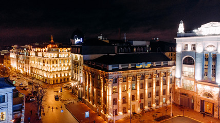 Obraz na płótnie Canvas View from drone to night Kyiv city with sky.