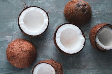 top view layout of fresh coconuts on a gray concrete  background