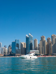 Fototapeta na wymiar Boat in marina Dubai sunny day summer