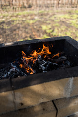 Barbecue fire on outdoor terrace