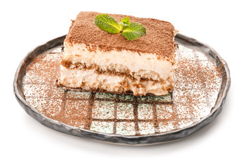 Plate with tasty tiramisu on white background