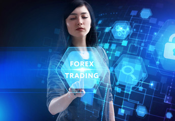 Business, Technology, Internet and network concept. Young businessman working on a virtual screen of the future and sees the inscription: Forex trading