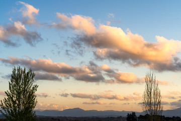 Golden clouds in the sky at sunset time. Basque Country of France. 