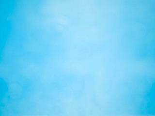 blue background with soft bokeh lights.