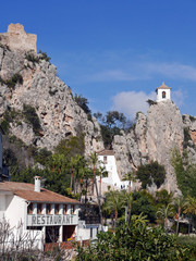 Bell tower of Guadalest castle on top of the rock, Spain.