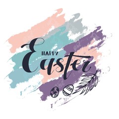 An Easter logo with eggs and a leaf on watercolour spots