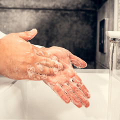 Coronavirus. Proper washing and handling of hands. Liquid antibacterial soap. Self-isolation and hygiene.