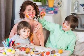 Preparations for Easter celebration with painting eggs and entertaining with family