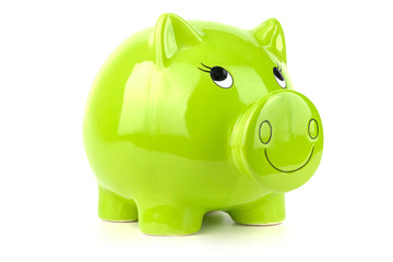 Green, green piggy bank isolated on a white background. Budget saving concept.