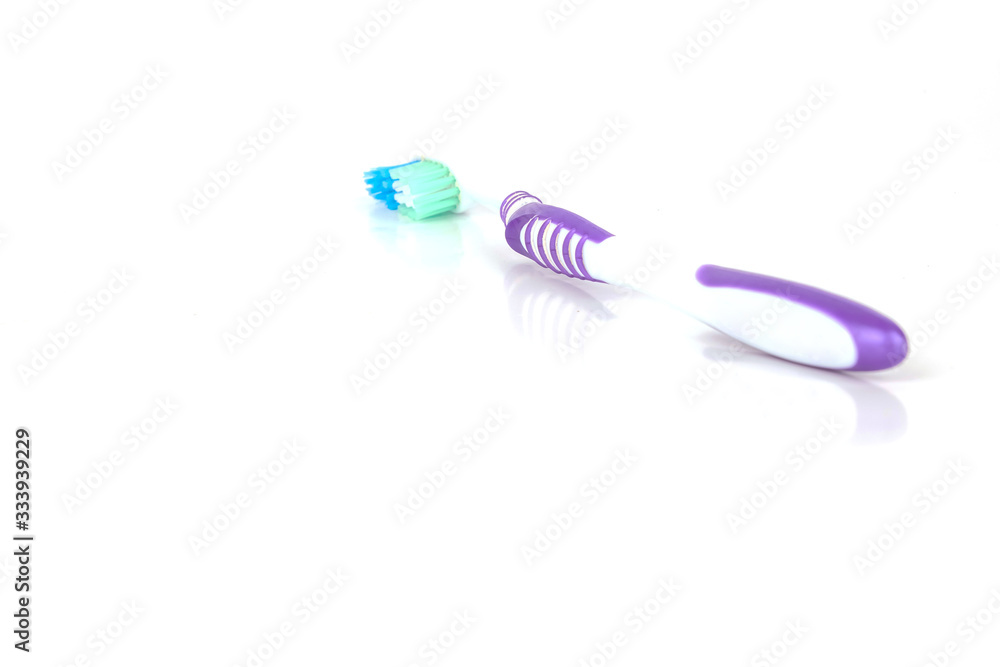 Wall mural toothbrush isolated on a white background.