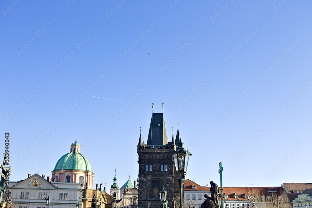 Wall mural view of the charles bridge tower and the statues on the charles bridge (prague, czech republic, euro