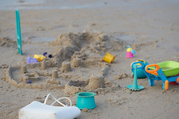 sand toys on beach castle sand in summer concept