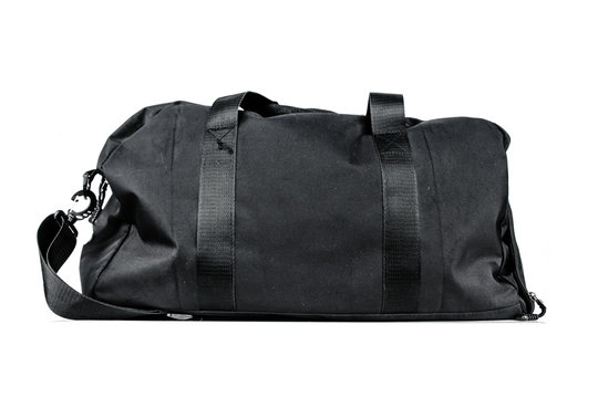 black travel bag isolated on white background. Travel concept.